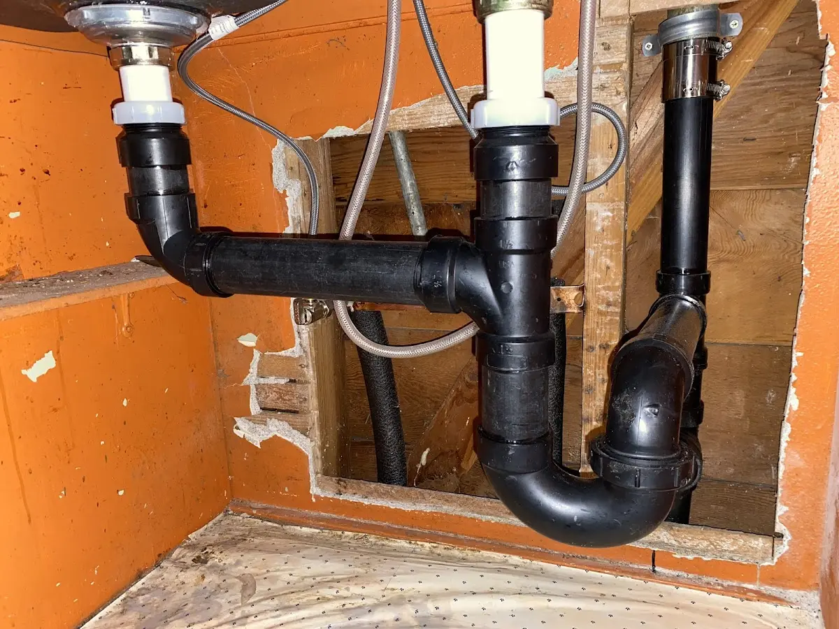 Professional Garbage Disposal Repair equipment and tools on the job in Milledgeville